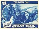 blue-tone lobby card for Chapter 12 of 'The Oregon Trail' 15-chapter serial starring Johnny Mack Brown