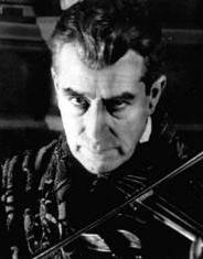 British actor Eille Norwood as Sherlock Holmes (with violin)