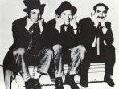 Harpo, Chico & Groucho Marx (seated) poster