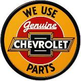 Genuine Chevrolet Parts {orange & black} round tin sign
