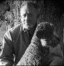 portrait of author John Steinbeck with his dog Charley